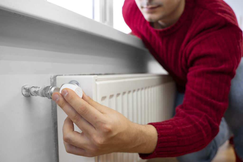 close-up-man-using-rotary-switch